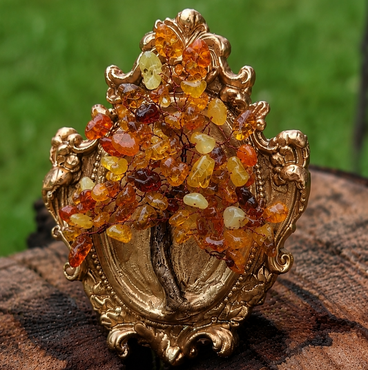 Luxury petite crystal tree with amber colored natural stones and ornate ceramic frame