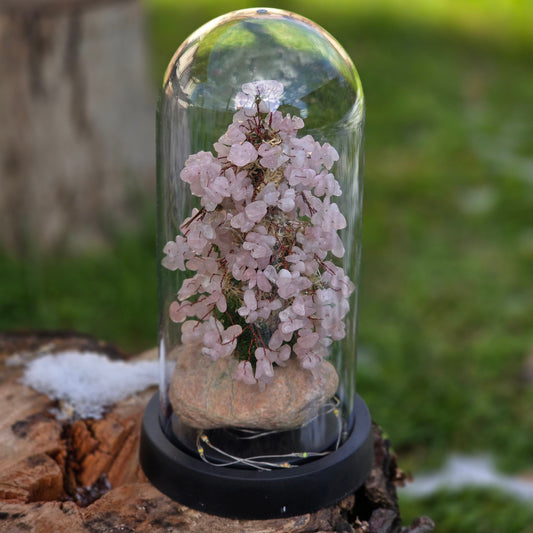 Handcrafted rose quartz Tree of Life sculpture detail showing natural gemstones and wire branches

