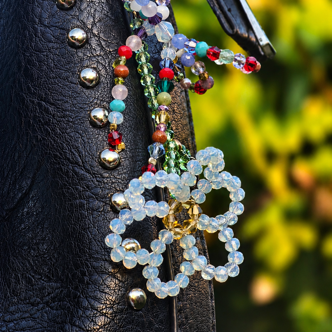 Designer inspired handbag accessory featuring Austrian crystals and natural gemstone beads in vibrant colors.