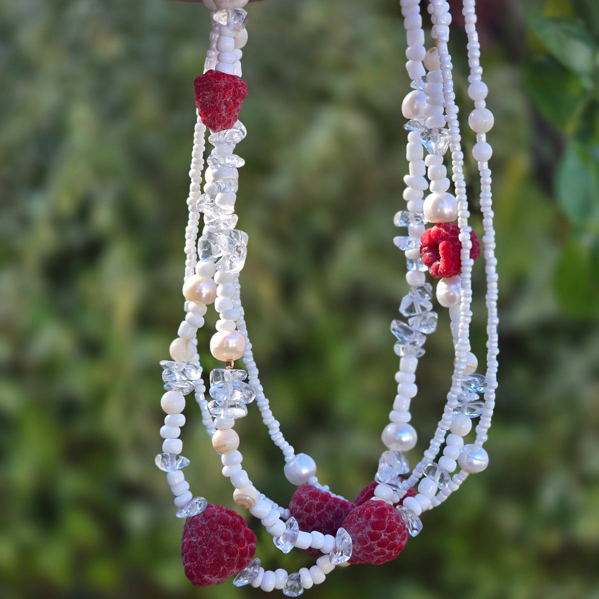 Handmade fruit necklace with three realistic polymer clay raspberries