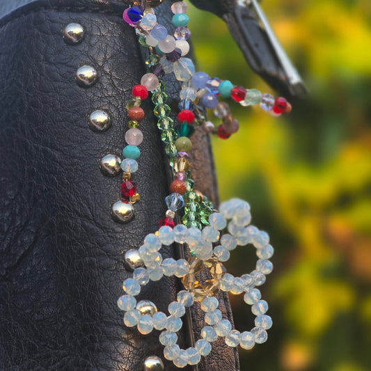 Luxury flower bag charm handcrafted with Austrian crystals and genuine gemstones including moonstone, tourmaline, agate, jade, amethyst, rose quartz and carnelian.