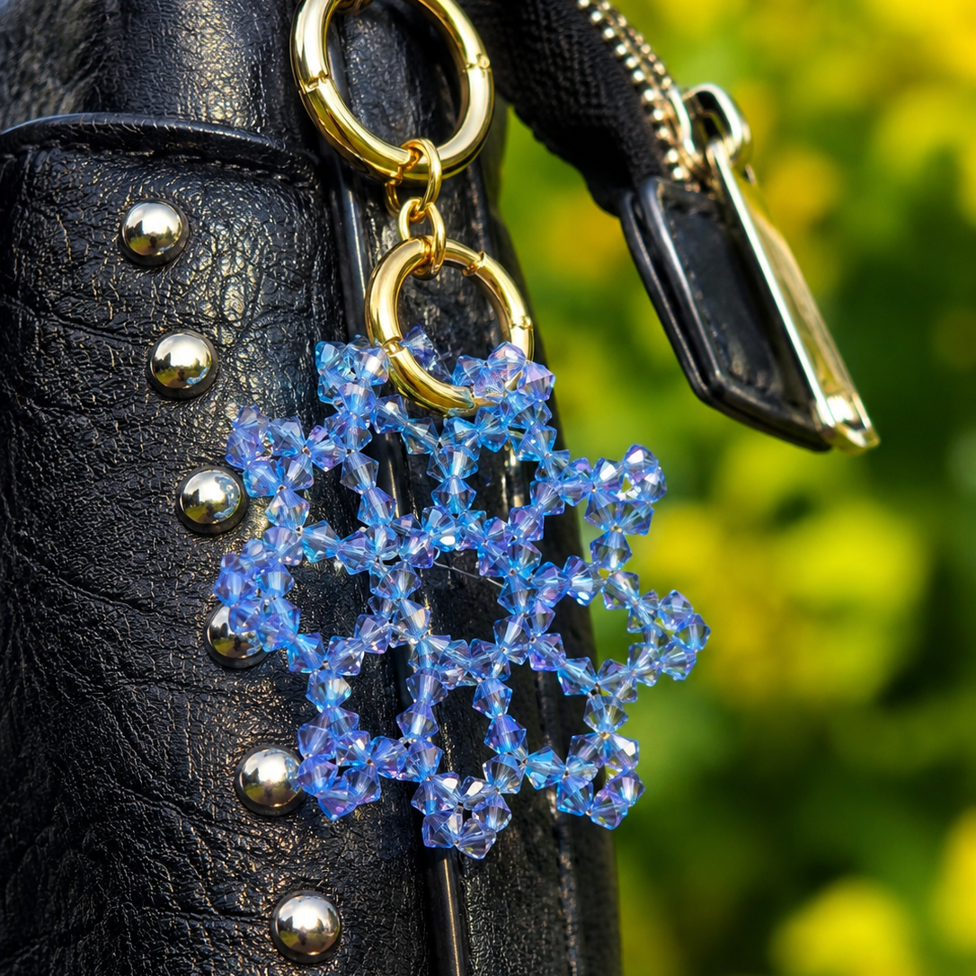 Luxury winter ornament and handbag accessory handcrafted from sparkling Austrian crystals.
Unique gift for her crystal snowflake bag charm designed and handmade by Sivona.