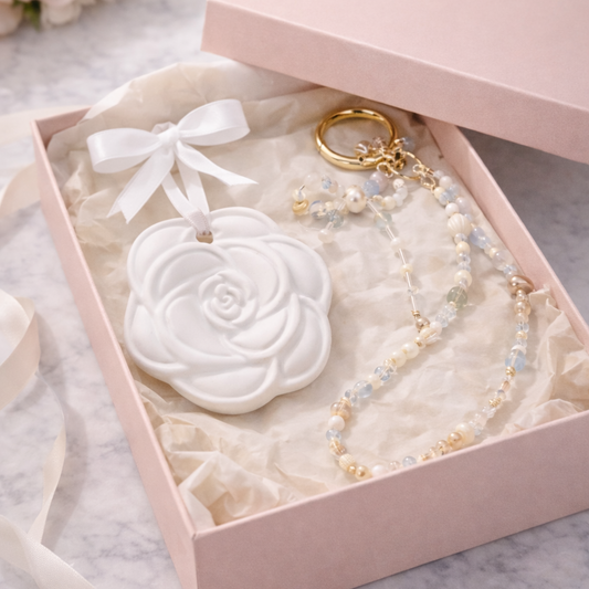 moonstone crystal gift set with bag charm and ceramic aromatherapy rose