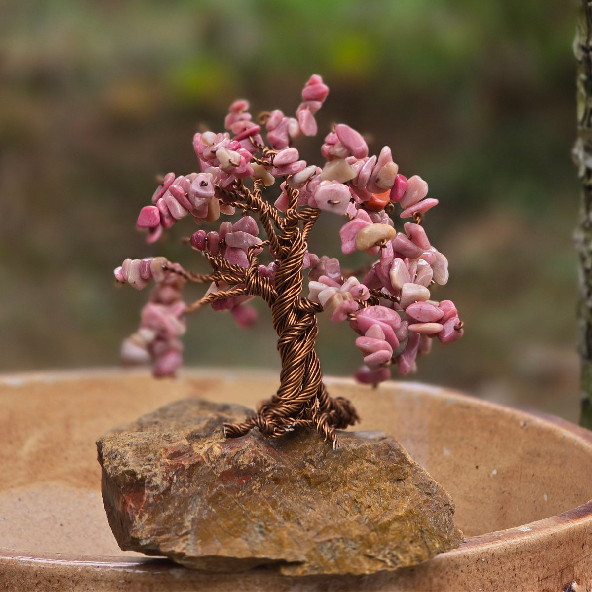 Natural Rhodonite gemstones on handcrafted Crystal Tree of Life
