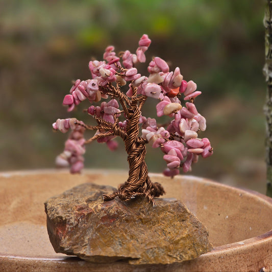 Natural Rhodonite gemstones on handcrafted Crystal Tree of Life