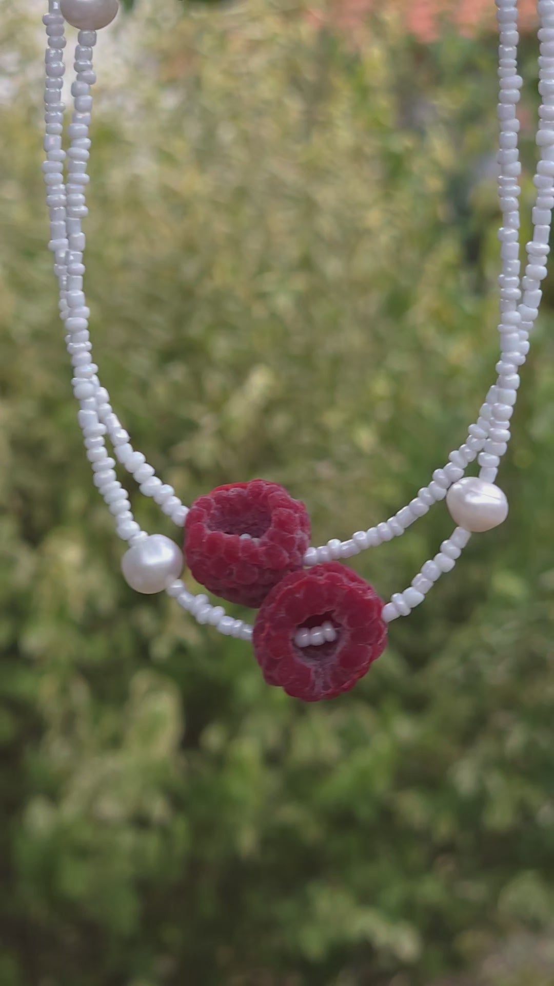 White pearl choker with realistic handmade raspberry