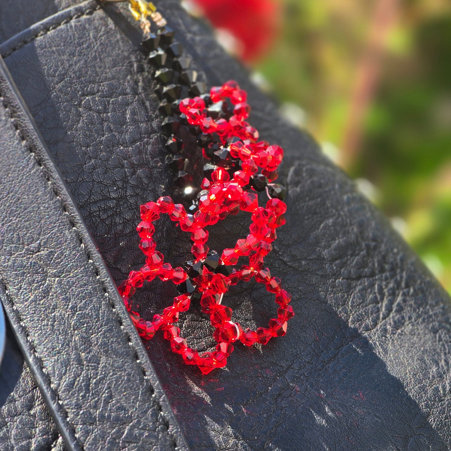 Red crystal flower bag charm with Austrian crystals and black tourmaline